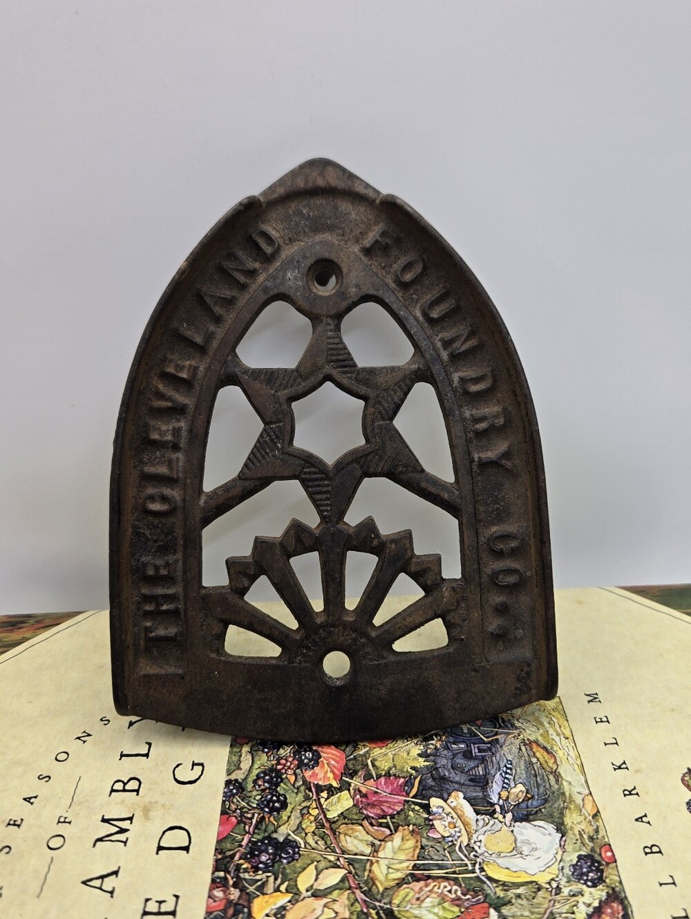 Antique Cast Iron Trivet Manufactured by The Cleveland Foundry Co. in Ohio.